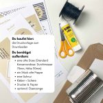 Benötigtes Material für das Motivation Geschenk: Eine leere Konservendose, Klebestift, Schere, Schnur und die ausgedruckte Pappyra-Vorlage auf einem Tisch.